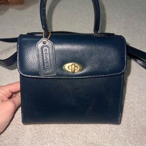 Coach Dark Blue Mini Bag with Gold Accents